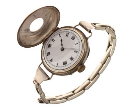 Early 20th Century lady's silver-cased wristwatch of 'Half Hunter' design with blue enamel Roman numerals, manual wind moveme