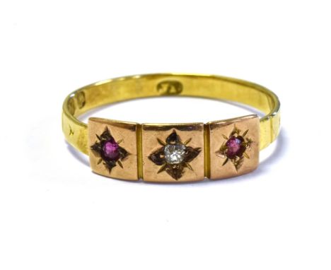 VICTORIAN 18CT GOLD RUBY &amp; DIAMOND RING with central star grain set old cut diamond flanked by a round cut ruby and red p