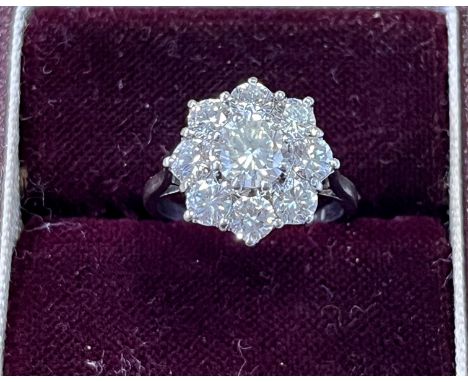 18CT GOLD WHITE DIAMOND CLUSTER RING 14.2mm diameter floral cluster head, claw set with estimated 2.08 carats of round brilli