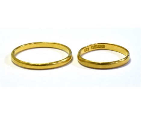 22CT GOLD WEDDING BANDS one 2.6mm wide, ring size N, hallmarked 22 Birmingham 1861.  One 2.1mm wide, ring size U, hallmarked 