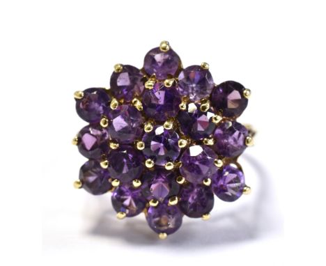 9CT GOLD &amp; AMETHYST CLUSTER RING 18.2mm diameter cluster with wire gallery set with round cut amethysts, ring size M 1/2.