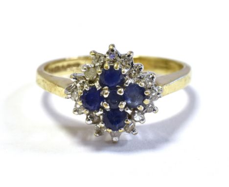 9CT SAPPHIRE &amp; DIAMOND CLUSTER RING set with five, cornflower blue round sapphires within a surround of single cut diamon