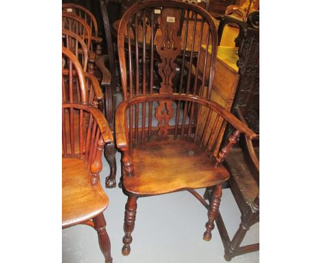 George III yew and elm Windsor armchair with a pierced splat and stick back above turned supports with crinoline stretcher