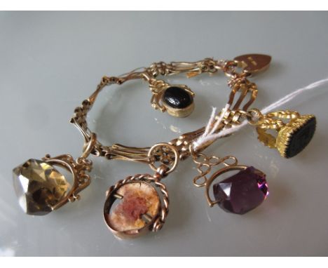 9ct Gold gate bracelet with attached fob seals