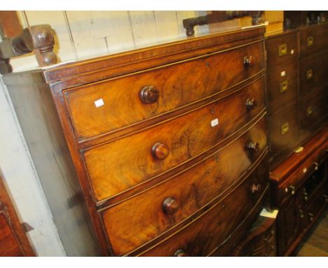 19th Century mahogany bow fronted chest of four graduated drawers with knob handles raised on splay bracket feet