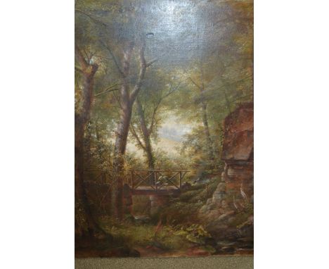 Unframed oil on canvas, woodland stream with wooden bridge, indistinctly signed (on tree trunk), 27.5ins x 22.5ins