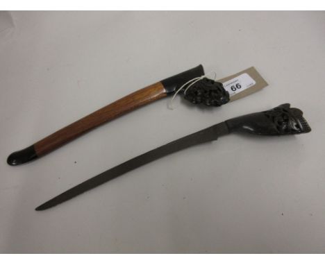 Antique Indonesian bade bade dagger with carved horn grip and scabbard mounts and a 7in steel blade