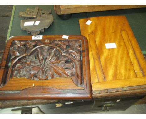 Late 19th Century walnut folding bookstand having pierced and carved decoration in the form of ivy leaves, acorns and thistle