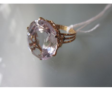 Yellow gold large oval pale amethyst set ring