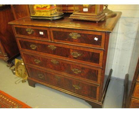 Early 18th Century walnut and crossbanded chest of two short and three long graduated drawers, with brass handles and escutch