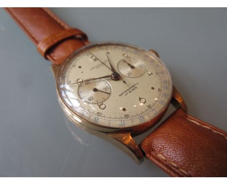 Gentlemans 18ct gold cased chronometer wristwatch, the silvered dial having Arabic numerals with centre seconds and two subsi