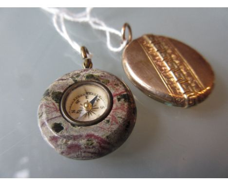 Victorian pendant locket together with a compass inset hardstone pendant