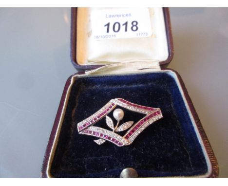 18ct White gold floral design brooch set diamonds, rubies and a pearl