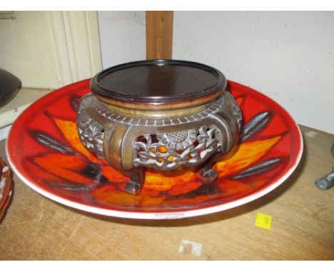 Early 20th Century lustre decorated pottery fruit bowl by Grimwades on a carved hardwood stand together with a Poole Pottery 