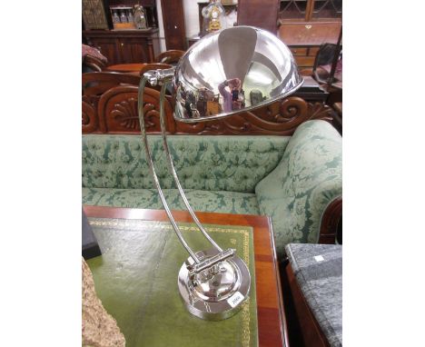 Large nickel plated crescent shaped adjustable desk lamp on circular base