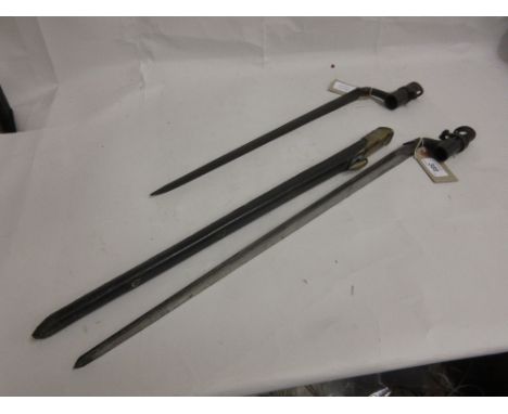 Two 19th Century socket bayonets, one with scabbard