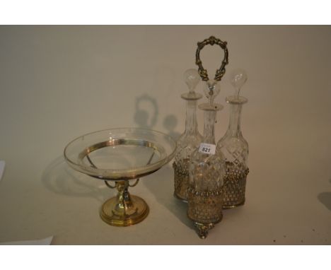 19th Century silver plated three bottle decanter stand with three cut glass bottles and stoppers, together with a plated dish