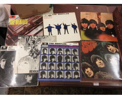 Group of seven Beatles long playing vinyl records including ' A Hard Days Night ', ' With the Beatles ' and ' Beatles for Sal