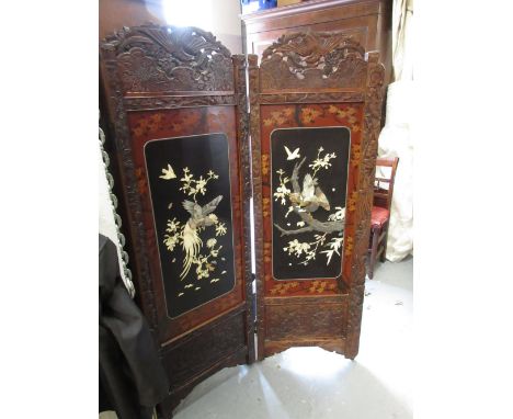 Late 19th Century Japanese lacquer four panel screen decorated in relief with flowers, birds, ivory and mother of pearl etc