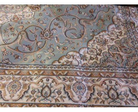 Green ground machine woven Kashan style carpet, 2.3m x 1.6m