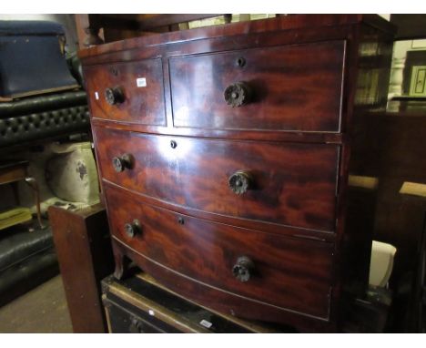 19th Century mahogany bow fronted chest of two short over two long drawers with brass knob handles and splay bracket feet