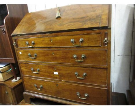 George III mahogany bureau, the fall front enclosing a fitted interior above four graduated drawers with bracket feet