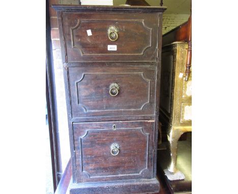 Regency mahogany pillar cabinet with moulded top above two cupboard doors and single drawer with brass ring handles and plint