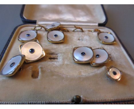 Pair of 9ct gold mother of pearl and sapphire set cufflinks together with five matching studs in a box
