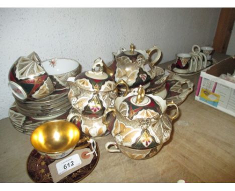 Austrian Alhambra porcelain breakfast set for four, together with a late 19th Century Dresden cabinet cup and saucer decorate