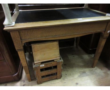 Early 20th Century oak rexine inset writing table together with a folding firescreen / occasional table