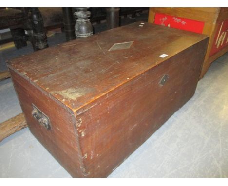 19th Century camphor wood rectangular trunk having hinged cover with iron end carrying handles