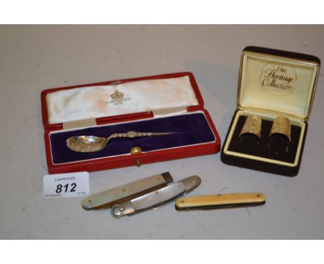 Cased silver Coronation anointing spoon, silver bladed mother of pearl fruit knife, two other penknives, cased pair of commem