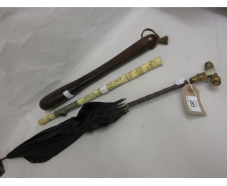 19th Century parasol with gilt mounted mother of pearl handle, wooden truncheon and a bone opium pipe