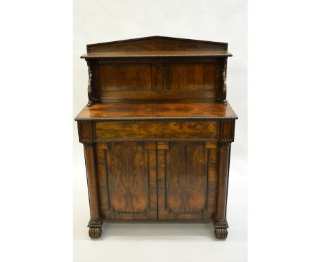 Small George IV rosewood chiffonier by T. and G. Seddon, the shelf back with scroll supports, the base with a single drawer a