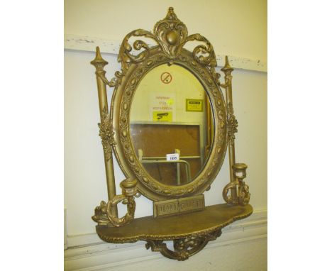 19th Century oval gilt framed two branch girandole with integral shelf (a/f)