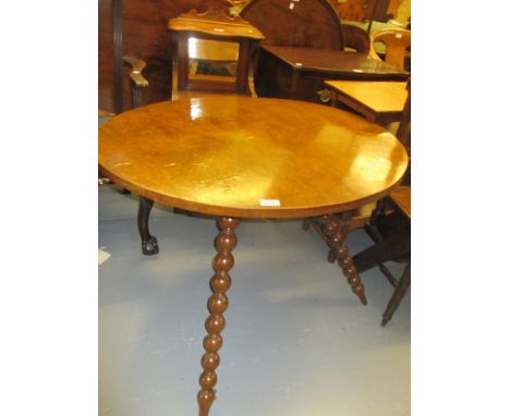 Circular burr elm cricket table on bobbin turned splayed tripod supports