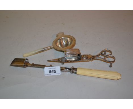 Sheffield silver tea strainer with mother of pearl handle, plated cheese scoop and wick trimmer