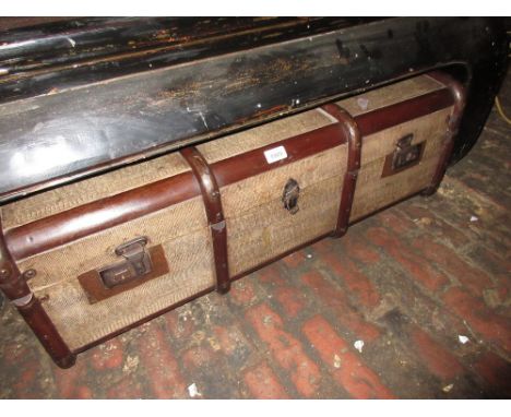 Late 19th or early 20th Century simulated lizard skin and wooden bound trunk