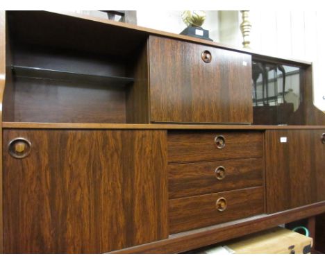 Greaves and Thomas, simulated rosewood side cabinet with a drop front flanked by open shelf and glazed doors above three draw