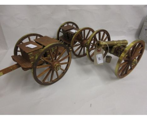 Wooden and brass mounted one tenth scale model of a Napoleonic field gun, circa 1815, together with two similar ammunition ca