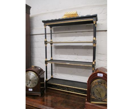 Reproduction ebonised and parcel gilt three shelf wall bracket in oriental style