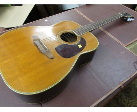 Harmony acoustic guitar (a/f) together with a blue covered travel trunk