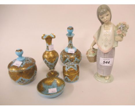 Lladro figure of a girl carrying a basket and a bunch of flowers together with a blue glass gilt decorated part dressing tabl