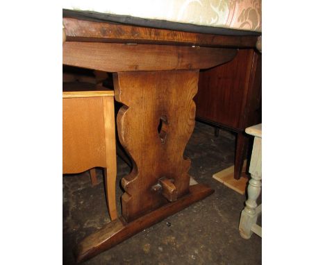 Reproduction oak refectory style dining table together with a set of six Ercol Windsor type dining chairs