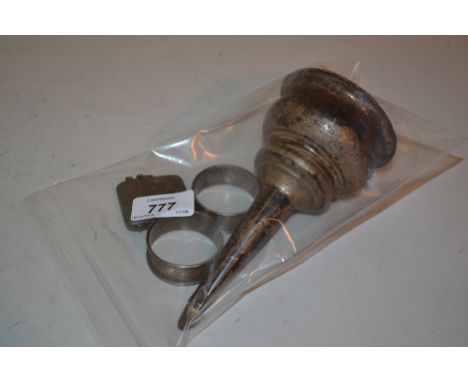 Pair of silver napkin rings with engine turned decoration, a silver vesta case with floral engraved decoration and a silver p