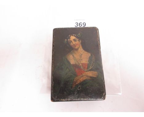 19th Century rectangular papier mache snuff box, the cover decorated with a half length portrait of a lady in a green dress