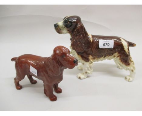 Goebel figure of a springer spaniel, 8.5ins long together with a Beswick figure of a spaniel, 7.5ins long