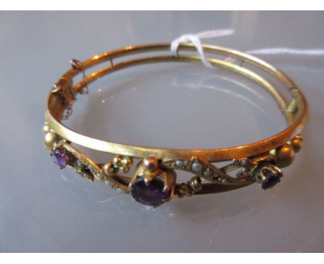 Edwardian 9ct gold amethyst and seed pearl mounted bangle