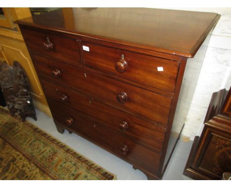 Small George III mahogany chest of two short and three long graduated drawers with brass swan neck handles and bracket feet