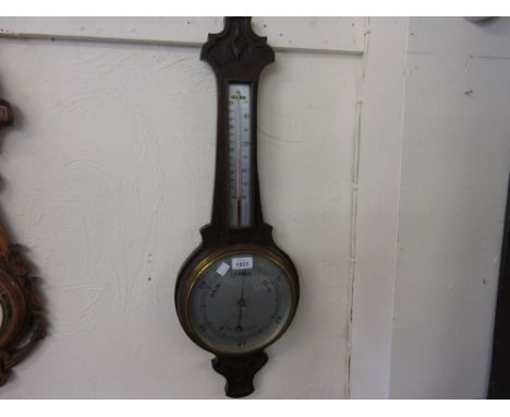 20th Century oak cased aneroid barometer / thermometer, the silvered dial inscribed Pearson and Son, Truro